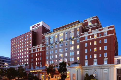 a hotel building with a sign on top of it at The Westin Nova Scotian in Halifax