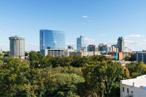 a view of a city skyline with buildings at AC Hotel By Marriott Raleigh Downtown in Raleigh