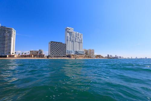 a view of a city from the water at Courtyard by Marriott Mazatlan Beach Resort in Mazatlán