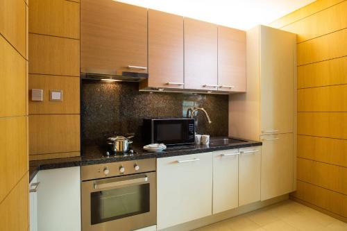 Кухня или мини-кухня в Marriott Executive Apartment Seoul
