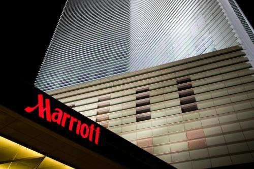 a building with a marriott sign in front of it at Ningbo Marriott Hotel in Ningbo