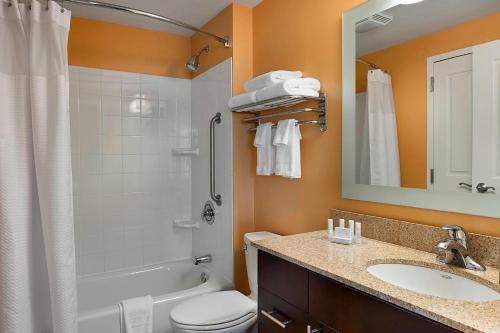 a bathroom with a sink and a toilet and a shower at TownePlace Suites by Marriott Rock Hill in Rock Hill