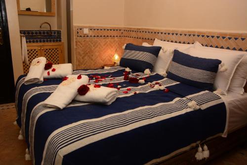 Voodi või voodid majutusasutuse Riad Bab Nour toas