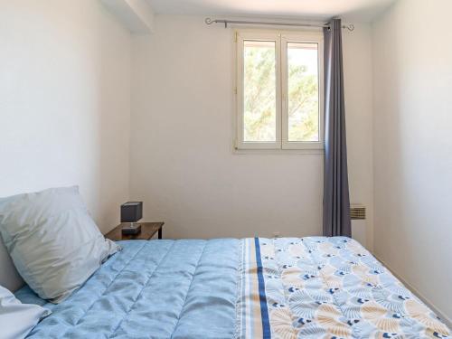 Una cama o camas en una habitación de Cosy holiday home in Minerve with garden