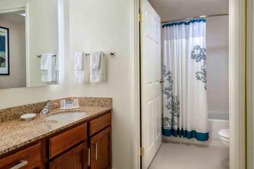 a bathroom with a sink and a shower at Residence Inn Macon in Macon