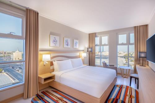 Un ou plusieurs lits dans un hébergement de l'établissement Residence Inn by Marriott Dammam