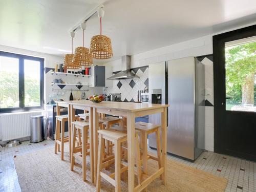 Una cocina o zona de cocina en Villa Saint-Vincent-de-Tyrosse, 6 pièces, 8 personnes - FR-1-413-144