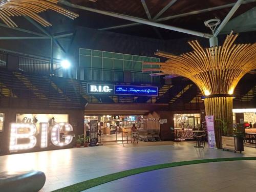 a large shopping mall with a big sign in the background at Walk to Legoland * D'Pristine * 2BR Lake View #6 in Nusajaya
