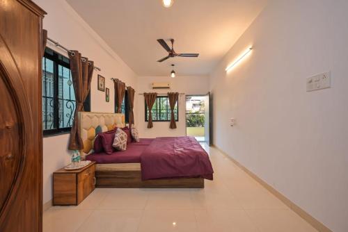 Ένα ή περισσότερα κρεβάτια σε δωμάτιο στο Orchid villa