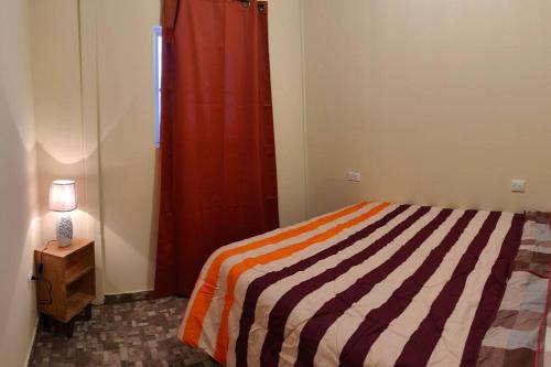 Łóżko lub łóżka w pokoju w obiekcie Casa completa en apaneca El salvador