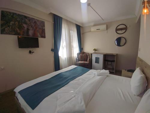 Katil atau katil-katil dalam bilik di Rumeli Konak Butik Otel