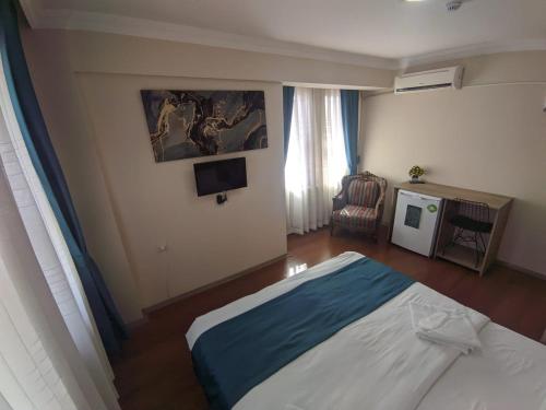Katil atau katil-katil dalam bilik di Rumeli Konak Butik Otel