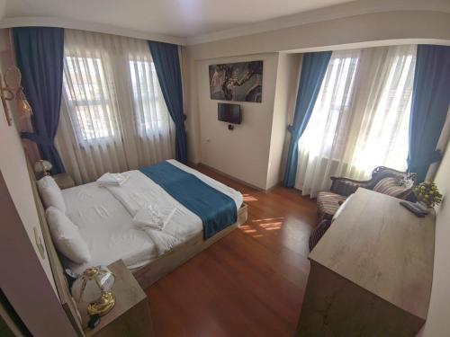Katil atau katil-katil dalam bilik di Rumeli Konak Butik Otel
