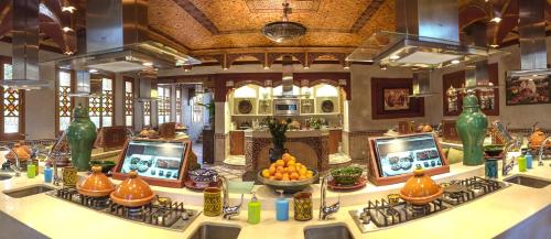 a room with a table with fruits on it at La Maison Arabe Hotel, Spa & Cooking Workshops in Marrakech