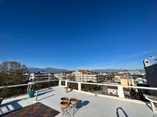 a balcony with a view of the city at Apartments Villa Effie in Paralia Katerinis