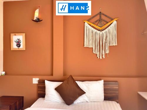 Krevet ili kreveti u jedinici u objektu HANZ Chuong Hotel