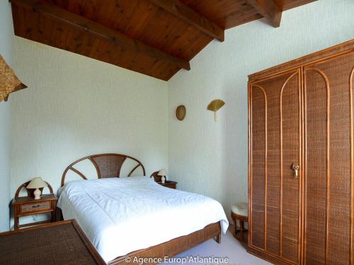 Postel nebo postele na pokoji v ubytování Maison La Palmyre, 4 pièces, 6 personnes - FR-1-705-11