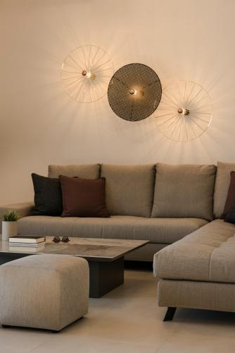 a living room with a couch and a coffee table at Claire villa in Sami