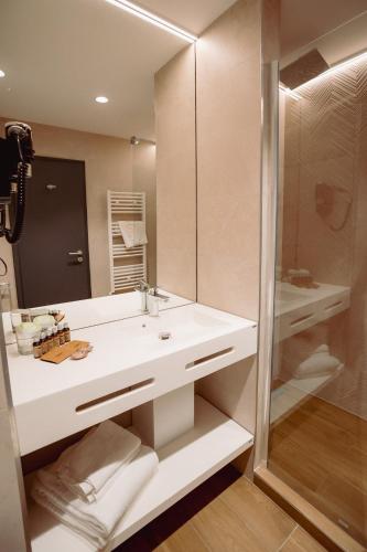 Ванная комната в Hotel Alexandrion Experience