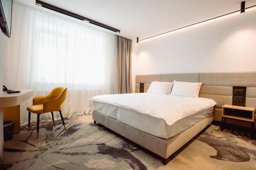 Кровать или кровати в номере Hotel Alexandrion Experience