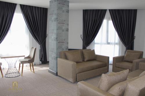 Posezení v ubytování Aram Otel Business & Luxury