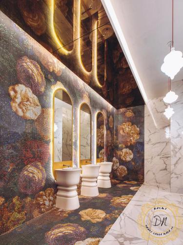 a room with a wall with a mural of donuts at ARTE Mont Kiara Relax & Go_Jacuzzi in Kuala Lumpur