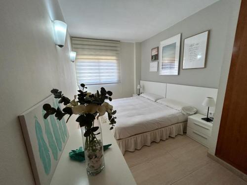 Postel nebo postele na pokoji v ubytování APARTAMENTO LOS GIRASOLES 1