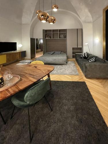 Una cama o camas en una habitación de Le Dimore del Toscano