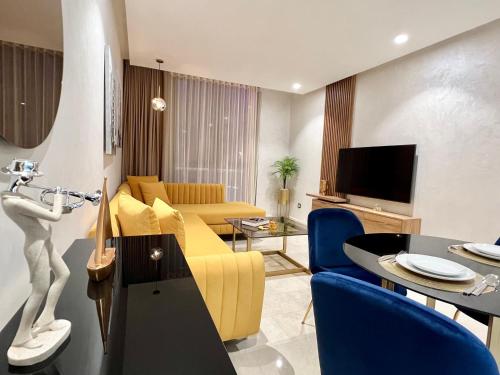 Μια τηλεόραση ή/και κέντρο ψυχαγωγίας στο ZEN Suites Hotel Massira