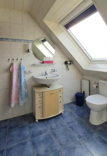 *Weigelt - Ferienwohnung Issyにあるバスルーム