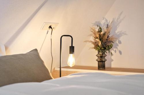 Ένα ή περισσότερα κρεβάτια σε δωμάτιο στο Sali Homes- Penthouse
