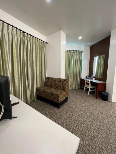 Postel nebo postele na pokoji v ubytování D Eastern Hotel