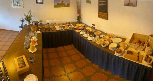 an overhead view of a long table with food on it at Hotel Klasen in Cochem