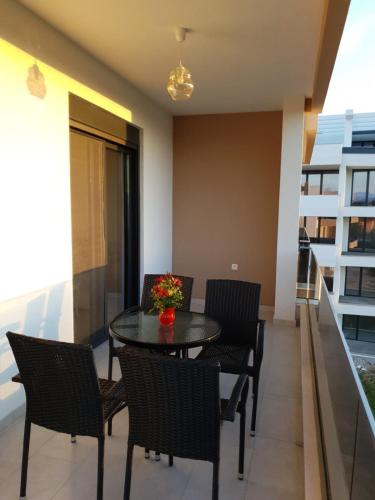 a dining room with a table and chairs at Apartments Alsa in Ulcinj