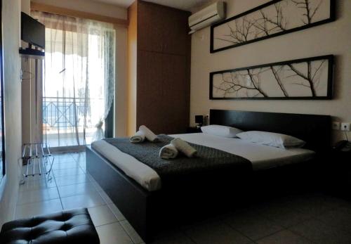 Postel nebo postele na pokoji v ubytování Sagini Boutique Hotel