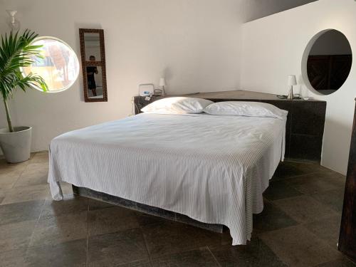 Ένα ή περισσότερα κρεβάτια σε δωμάτιο στο Villa Bamboo