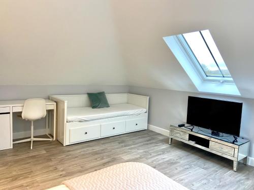 Μια τηλεόραση ή/και κέντρο ψυχαγωγίας στο Luxury 2 bed home