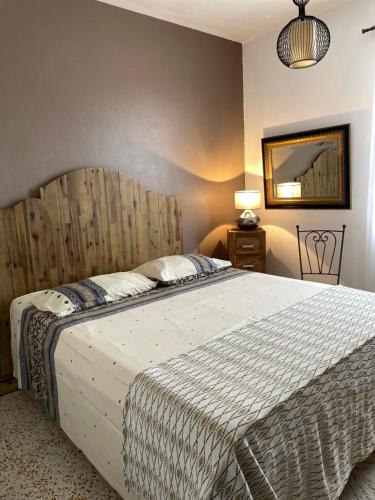 Un pat sau paturi într-o cameră la Villa de la Plage