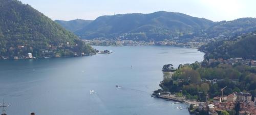 a view of a lake with a town and a city at Holiday Home Vista Lago in Cernobbio