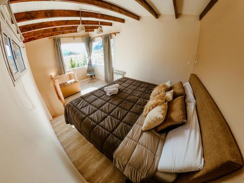 Ένα ή περισσότερα κρεβάτια σε δωμάτιο στο Patagonia Natural Apart