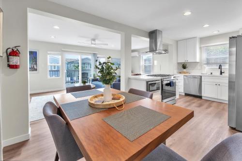a kitchen and dining room with a table and chairs at Tower 9 #1 in Oceanside