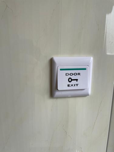 a clock on a wall with the words door or exit at HAUS-DONAU in der Wachau in Aggsbach