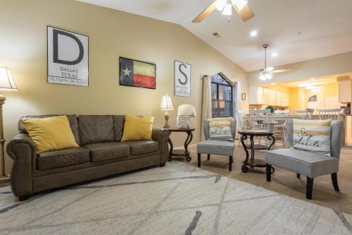 a living room with a couch and two chairs at 2BR Penthouse Condo - 2 Pools - Close to the Strip - Stairs Required - FREE TICKETS INCLUDED - FHC-24 in Branson