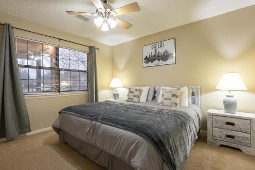 a bedroom with a bed and a ceiling fan at 2BR Penthouse Condo - 2 Pools - Close to the Strip - Stairs Required - FREE TICKETS INCLUDED - FHC-24 in Branson