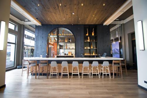 Ο χώρος του lounge ή του μπαρ στο Apart Enjoy Pucón