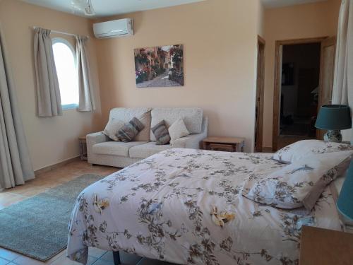 Postel nebo postele na pokoji v ubytování Casa Gregory