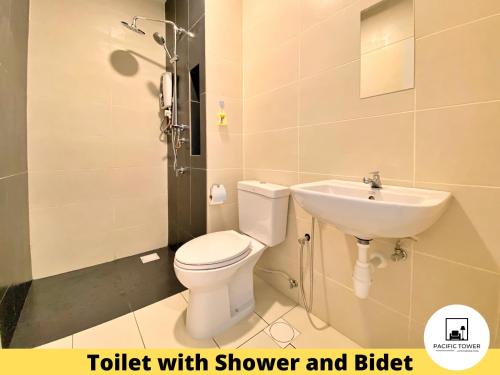 a bathroom with a sink and a toilet with shower and bidet at Pacific Homestay Petaling Jaya @ 1 Utama and Universiti Malaya in Petaling Jaya