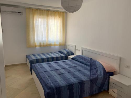 Postel nebo postele na pokoji v ubytování Casa vista mare a Shengjin