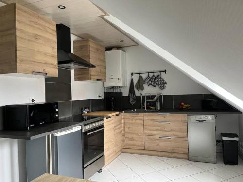 Kuchyňa alebo kuchynka v ubytovaní Appartement T3 rénové 60m2 proche centre Colmar