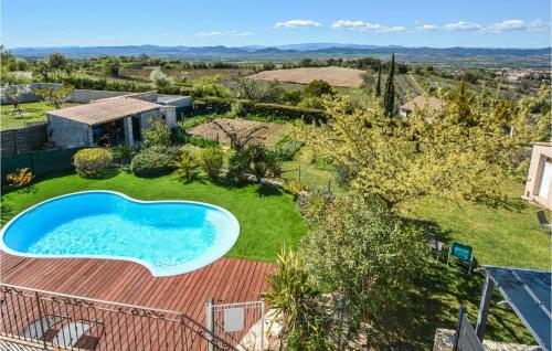 an overhead view of a backyard with a swimming pool at Beautiful Home In Barjac With Swimming Pool in Barjac